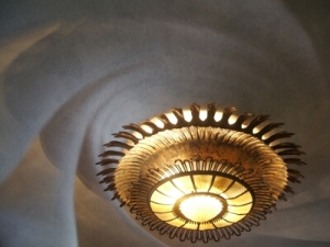 The cieling and chandelier of the parlour, representing a whirlpool.